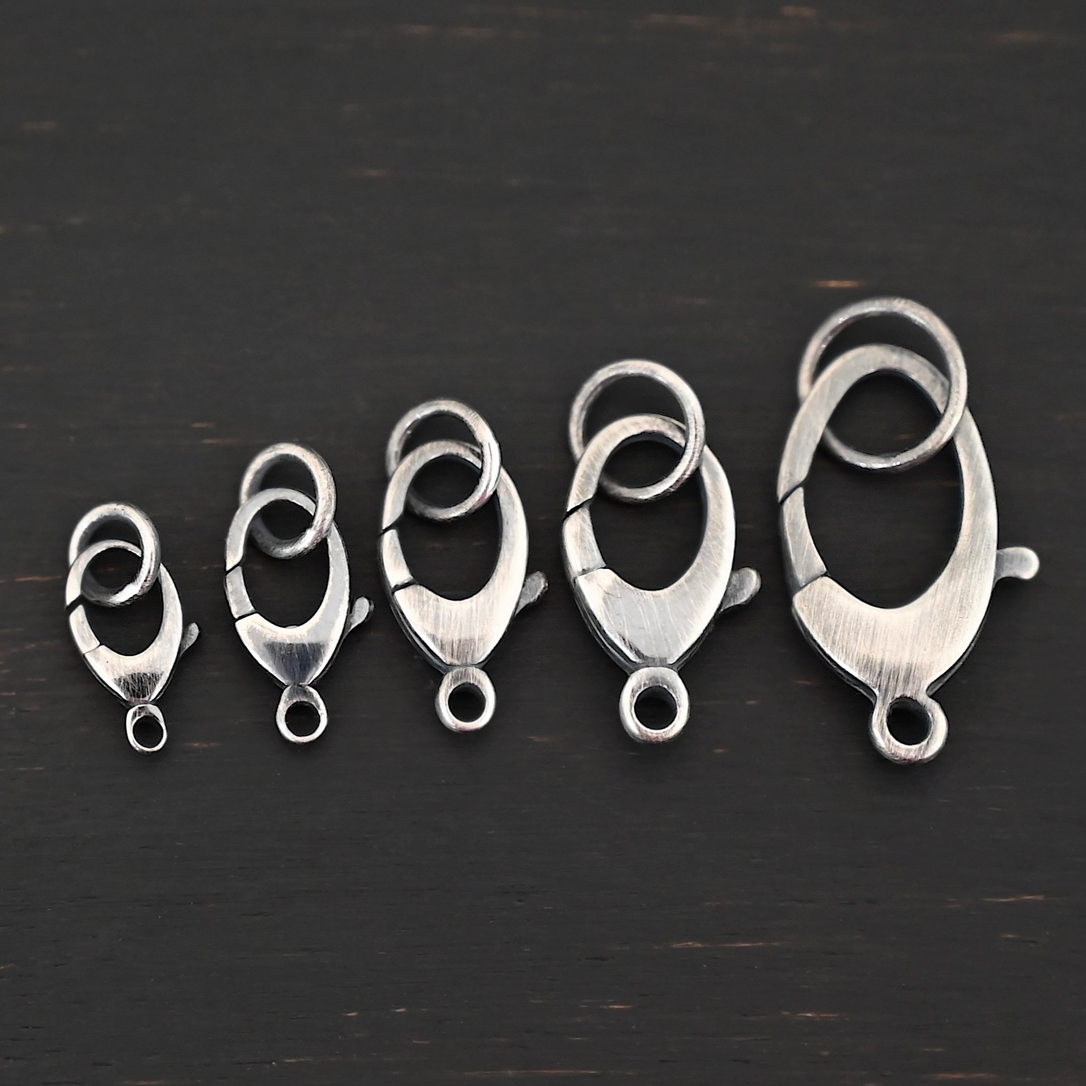 Luna Lobster Claw Clasp with JR - oxidized shown on dark background