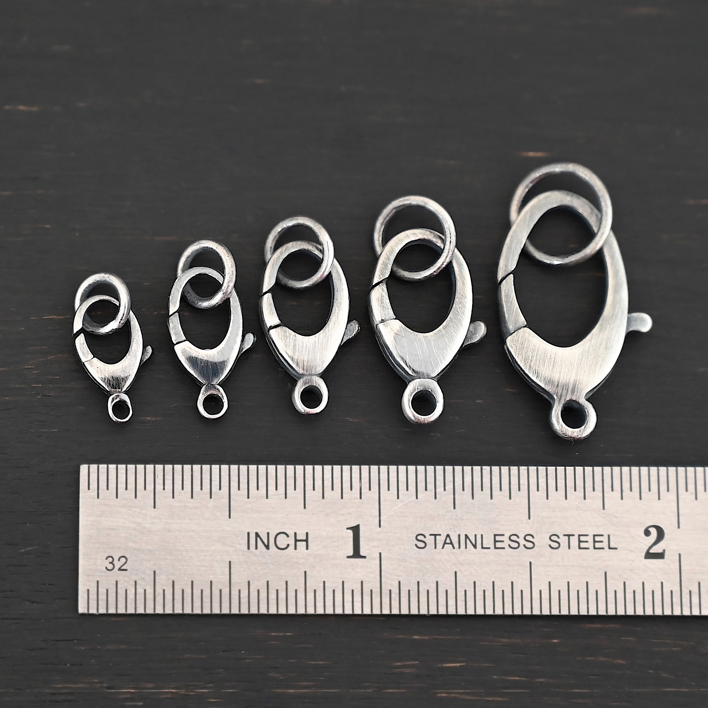 Luna Lobster Claw Clasp with JR - oxidized shown by ruler