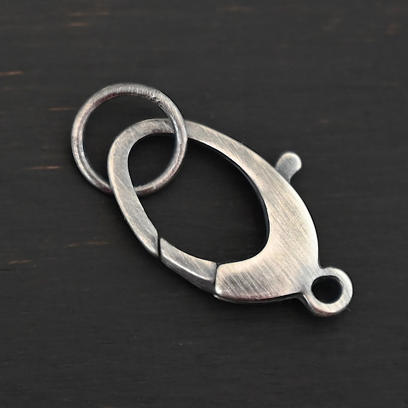 Luna Lobster Claw Clasp with JR - oxidized shown on dark background