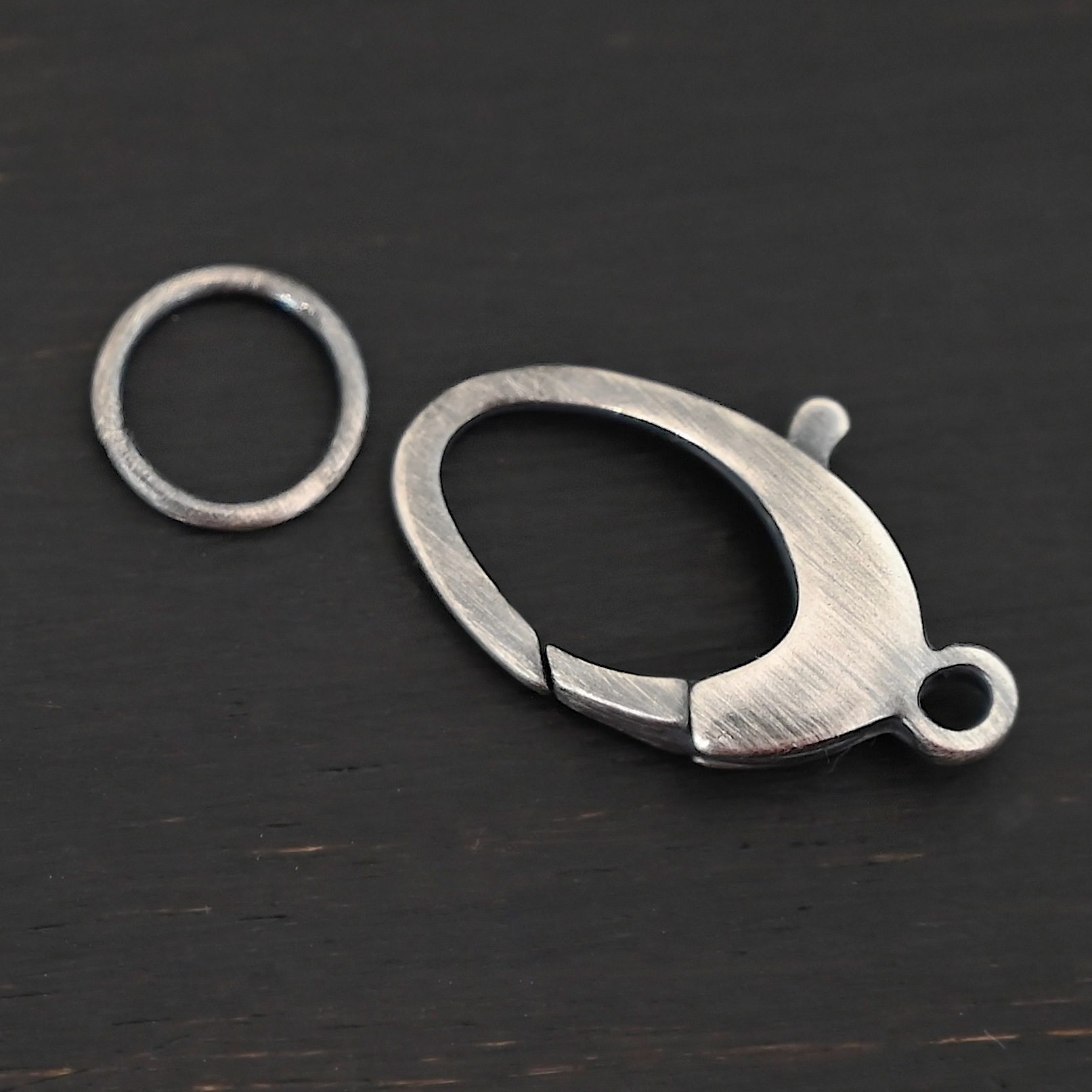 Luna Lobster Claw Clasp with JR - oxidized shown on dark background