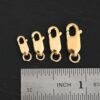Lacey 14k gold filled Lobster Claw Clasp shown by ruler