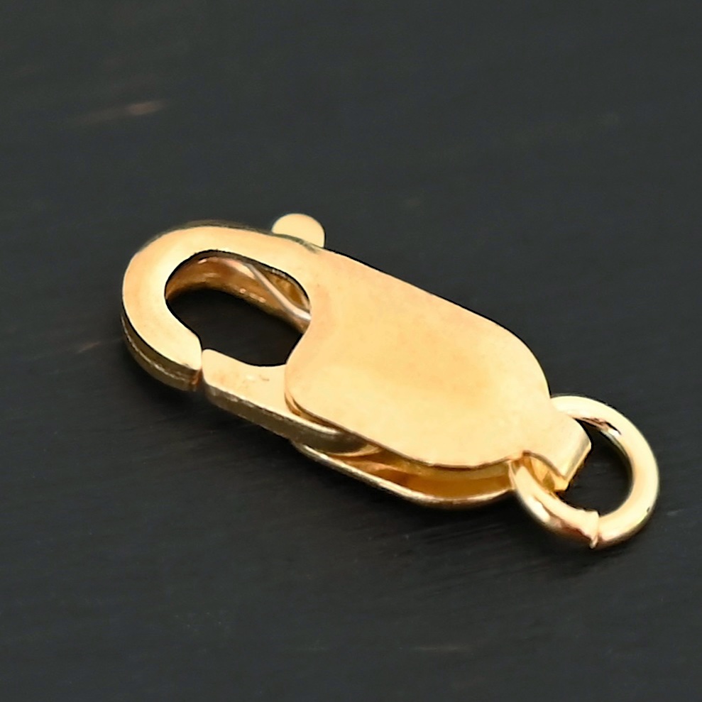 Lacey 14k gold filled Lobster Claw Clasp shown on dark background