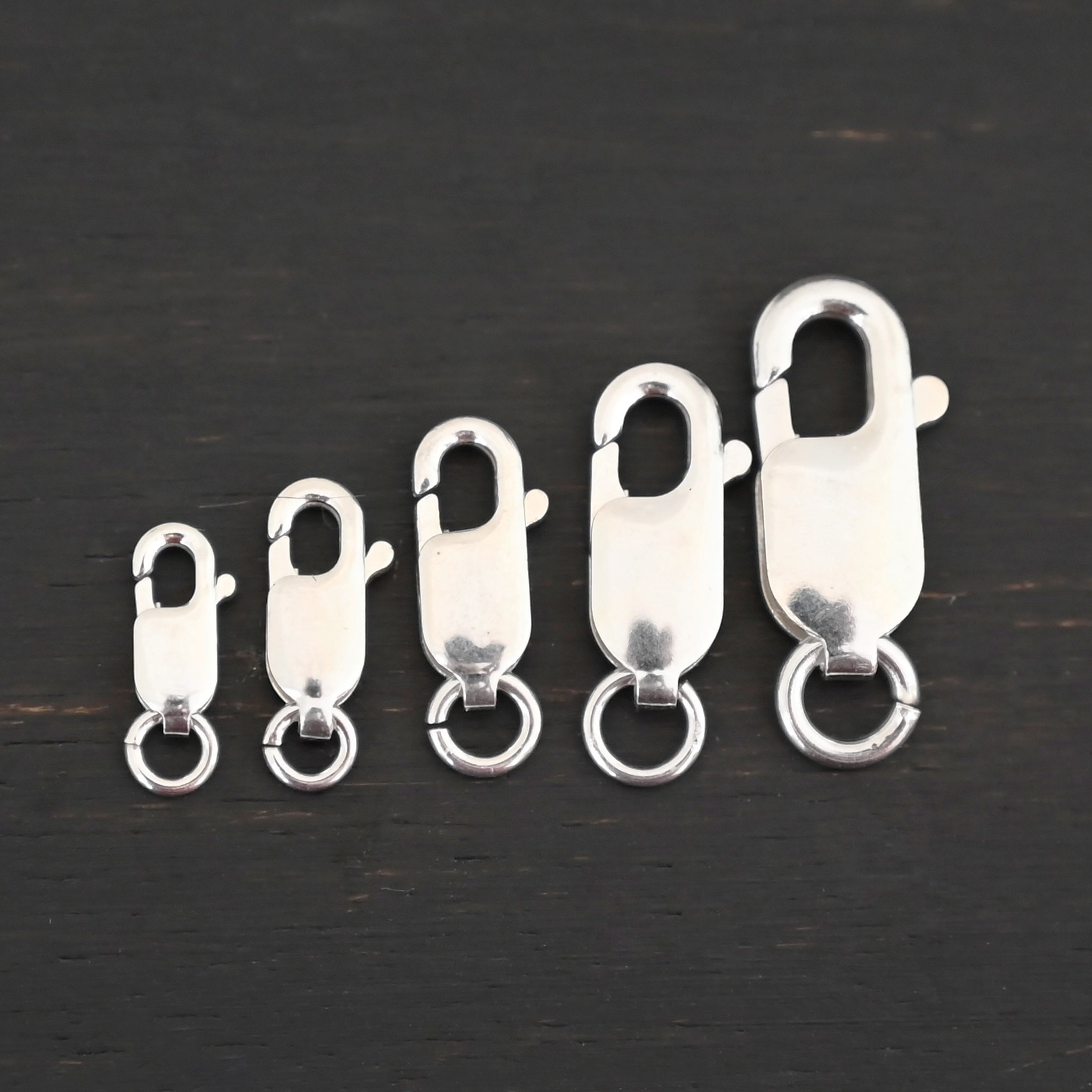 Lennon Lobster Claw - shiny shown on dark background