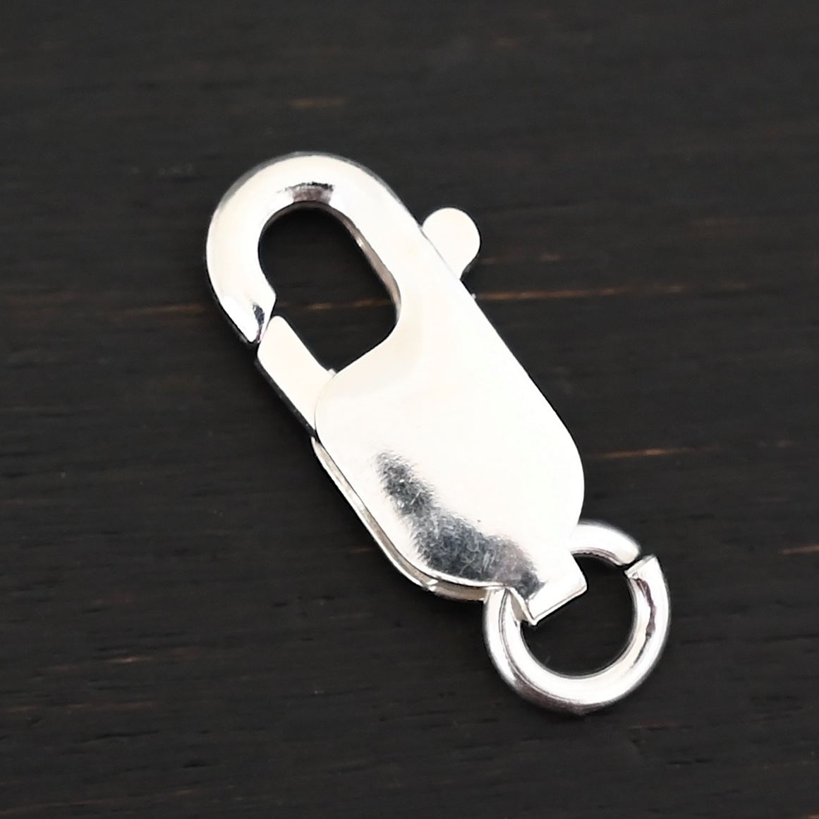 Lennon Lobster Claw - shiny shown on dark background