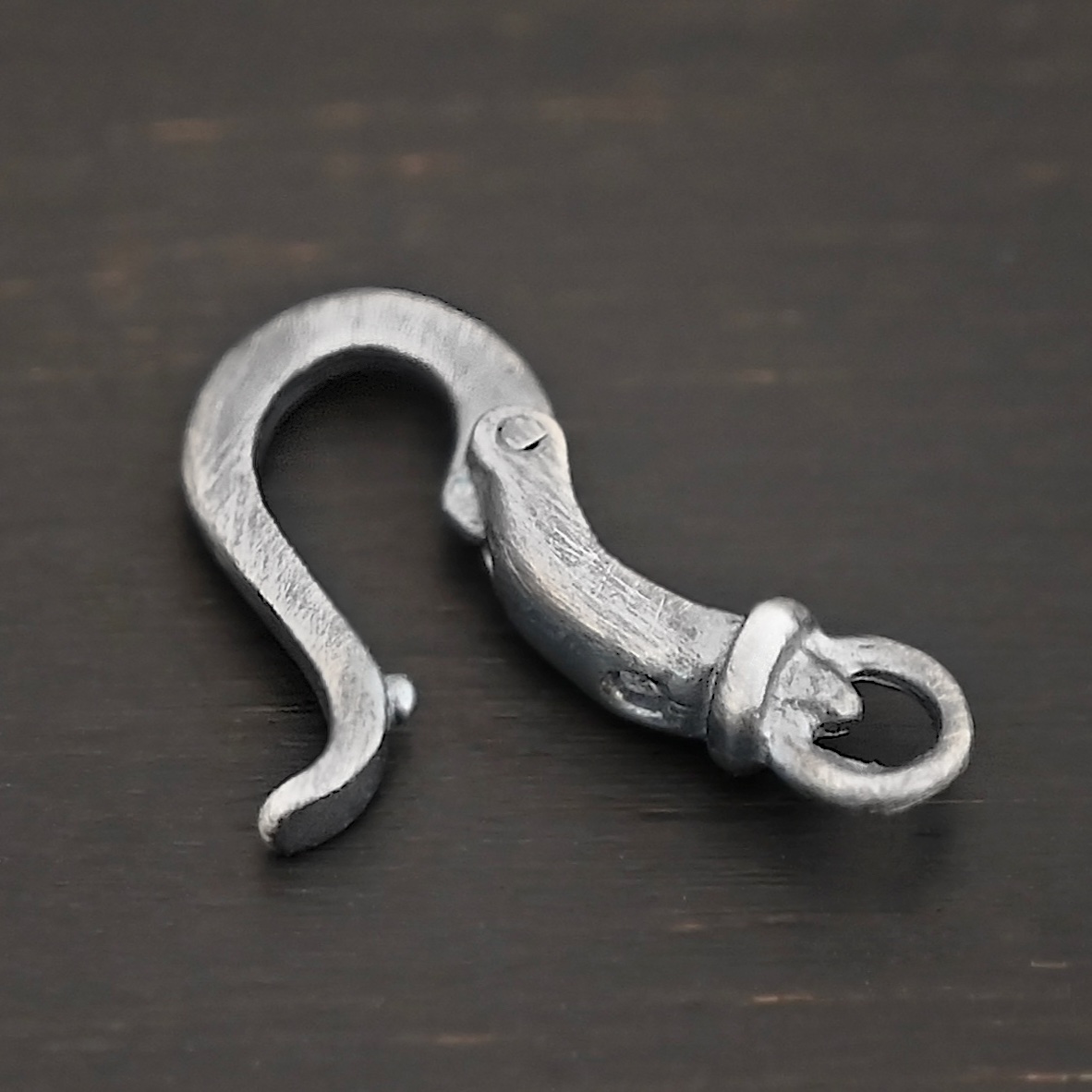 Henry Hook Clasp - oxidized shown on dark background