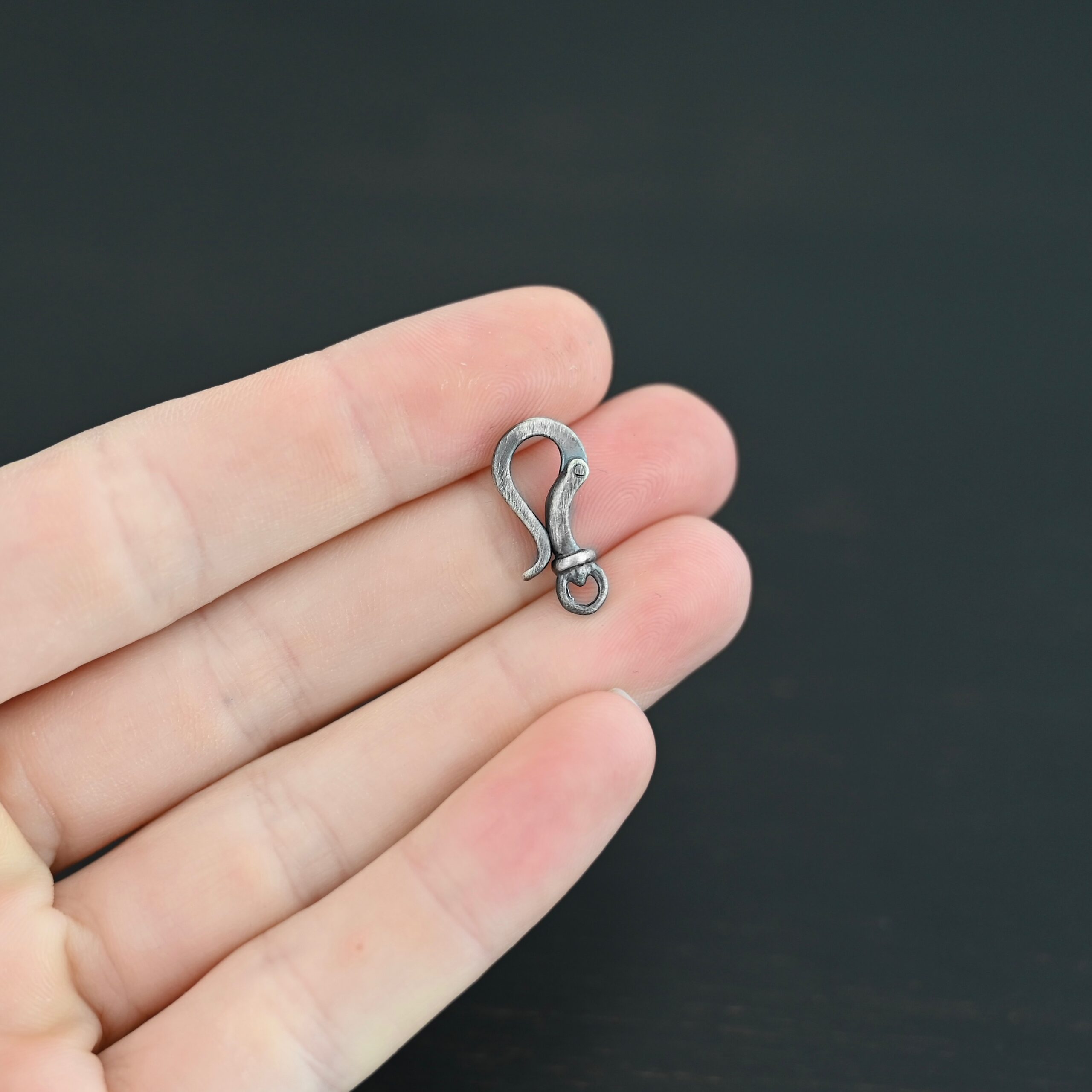 Henry Hook Clasp - oxidized shown in hand