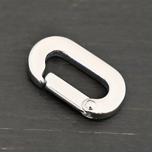 Perry Stainless Oval Clasp shown on dark background