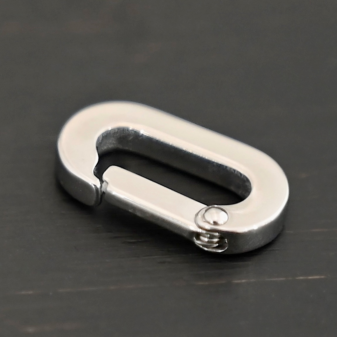 Perry Stainless Oval Clasp Perry Stainless Oval Clasp shown on dark background