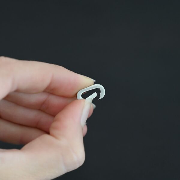 Perry Stainless Oval Clasp shown in hand