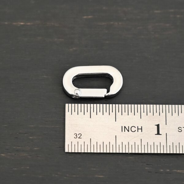 Perry Stainless Oval Clasp shown by ruler