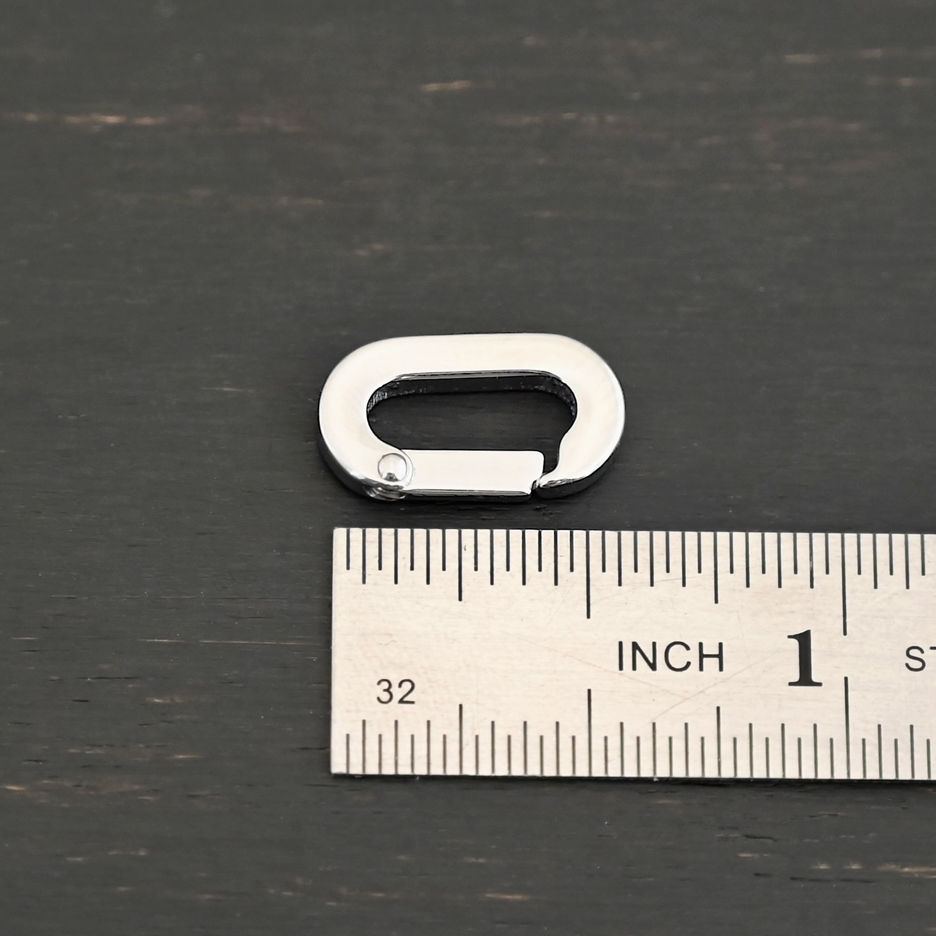 Perry Stainless Oval Clasp Perry Stainless Oval Clasp shown by ruler