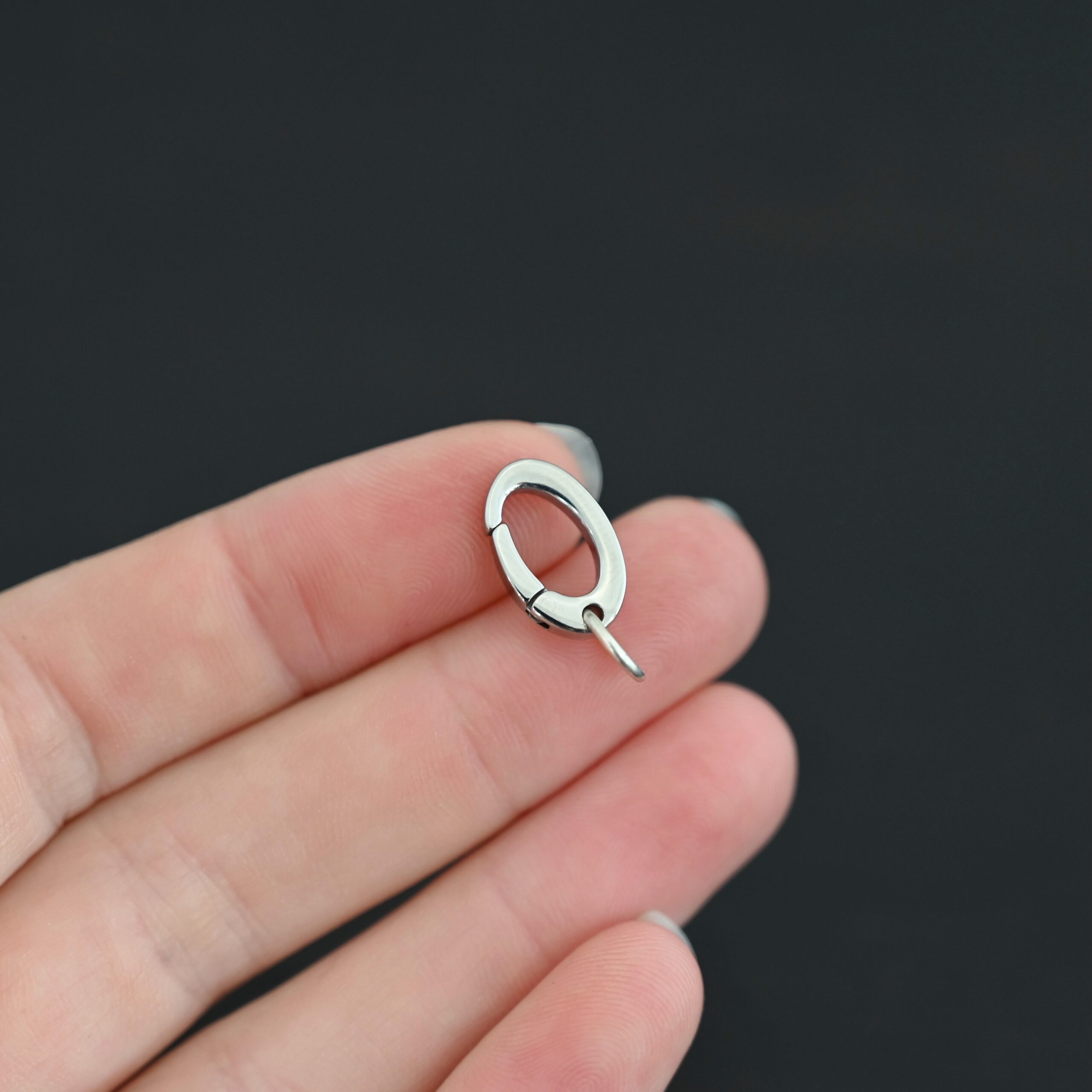 Paul Stainless Oval Clasp Paul Stainless Oval Clasp shown in hand