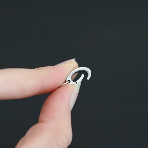 Paul Stainless Oval Clasp shown in hand