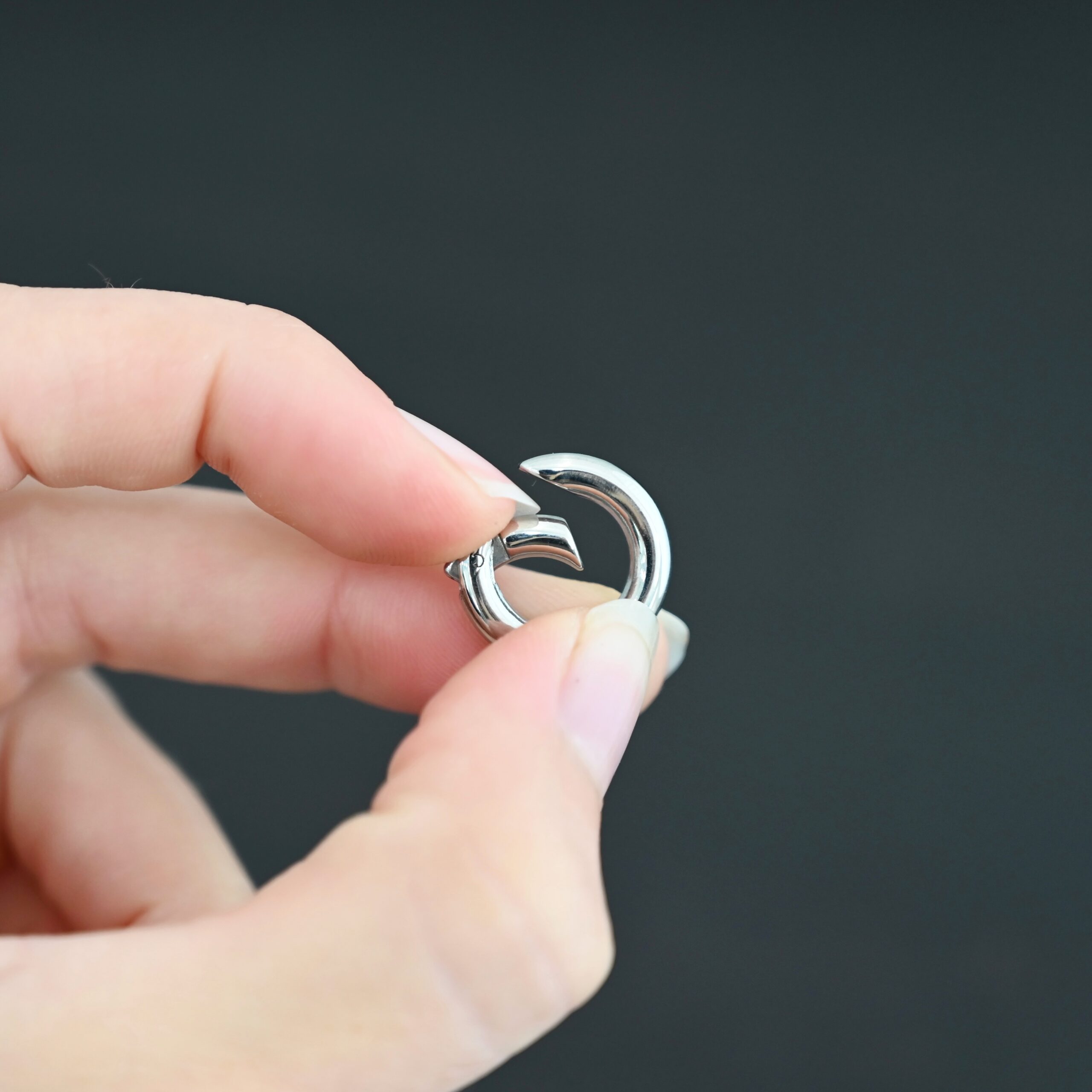 Pheonix Stainless Oval Clasp - 18mm shown in hand