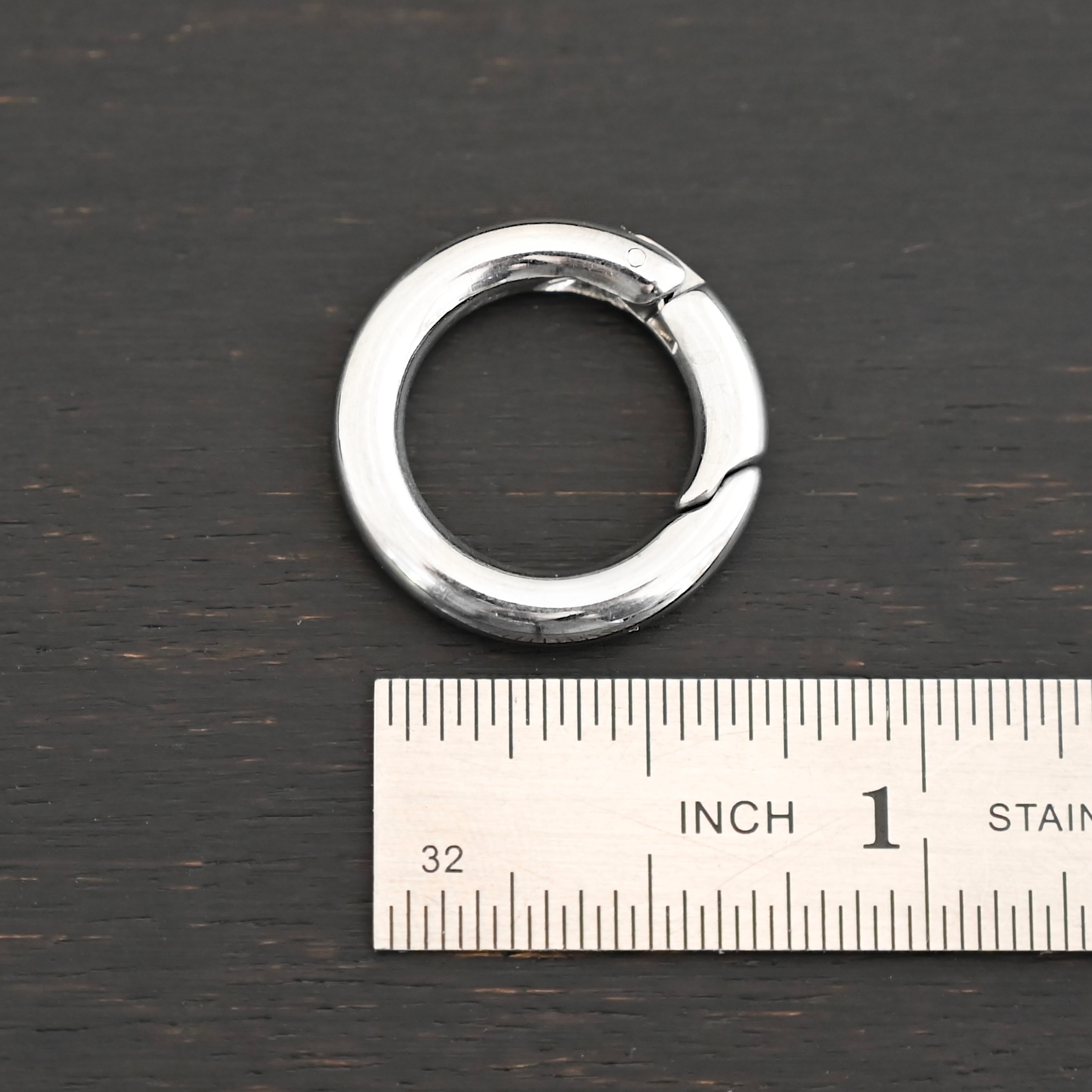 Pheonix Stainless Oval Clasp - 20.5mm shown by ruler