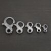 Faith Figure Eight Clasp - oxidized shown on dark background
