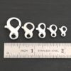 Faith Figure Eight Clasp - shiny shown by ruler