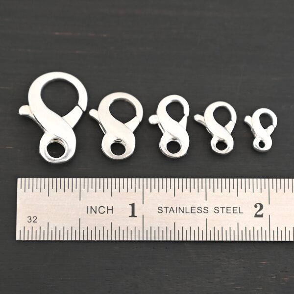Faith Figure Eight Clasp - shiny shown by ruler
