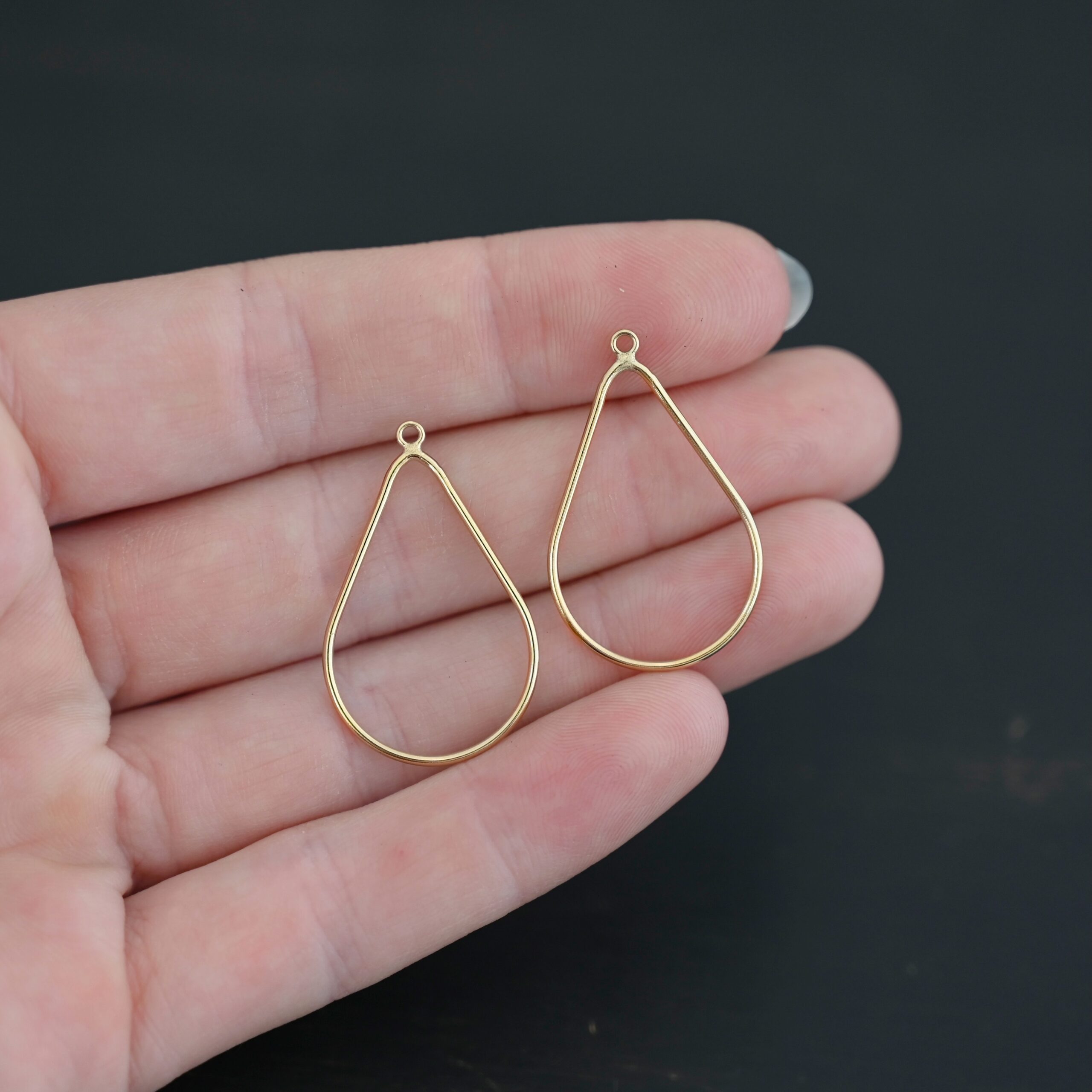 Talia - 14k gold filled Teardrop Chandelier - 29x20mm smooth shown in hand