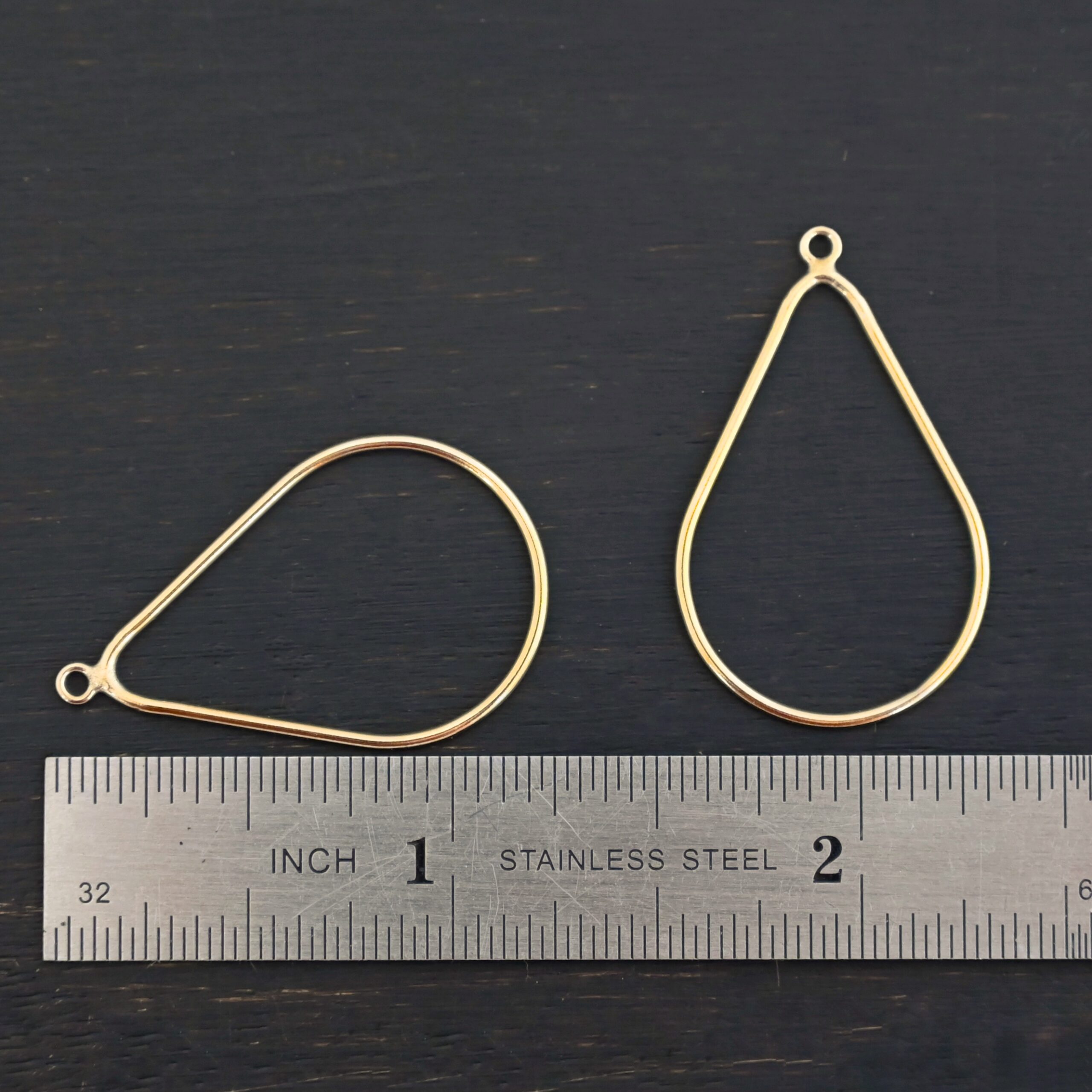 Talia - 14k gold filled Teardrop Chandelier - 29x20mm smooth shown by ruler