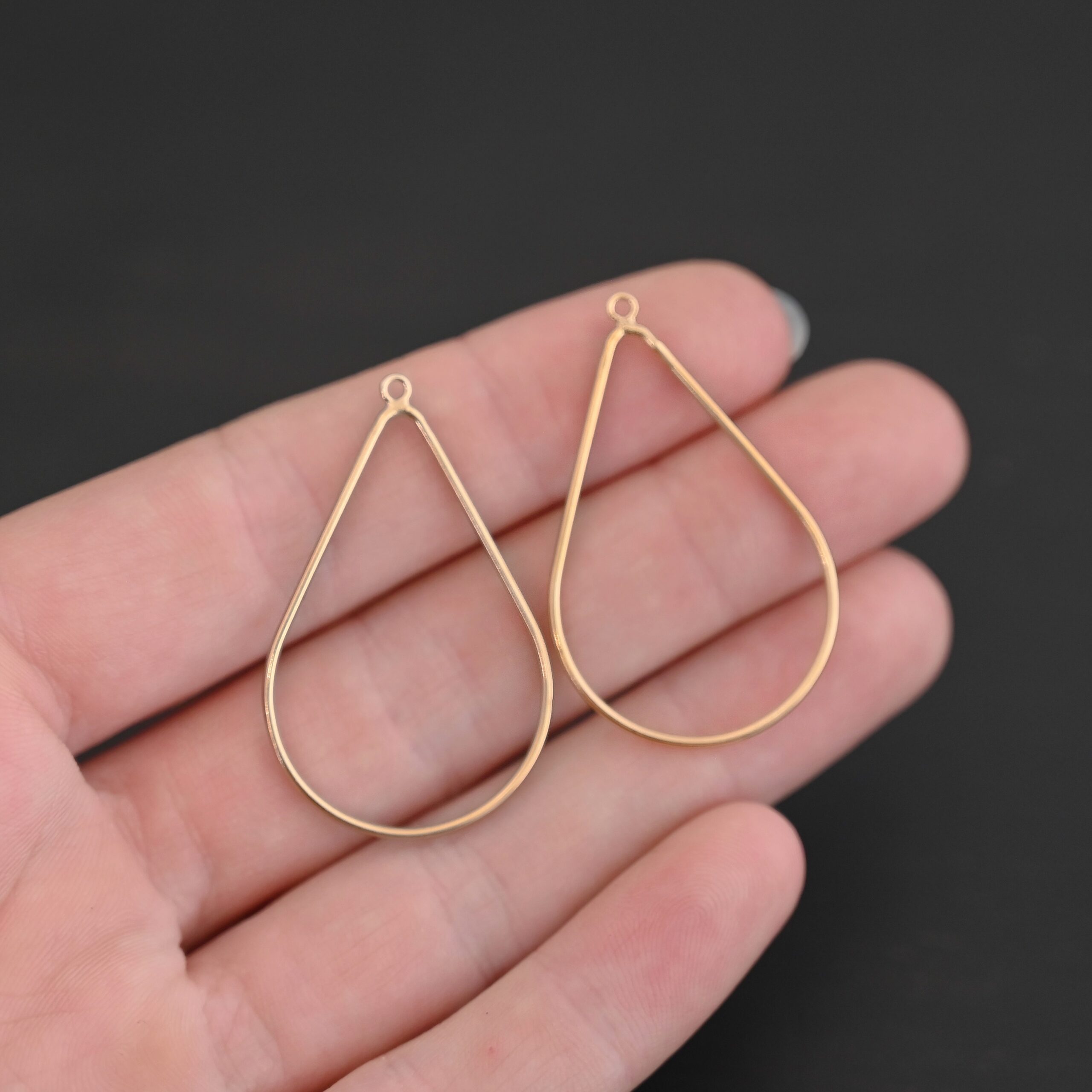 Talia - 14k gold filled Teardrop Chandelier - 38x25mm smooth shown in hand