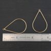 Talia - 14k gold filled Teardrop Chandelier - 38x25mm smooth shown by ruler
