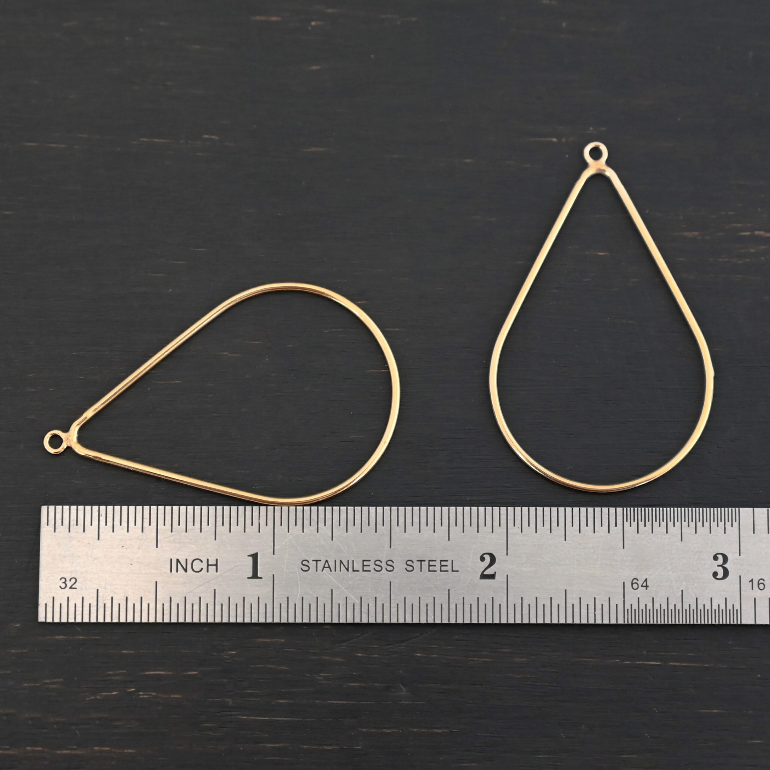 Talia - 14k gold filled Teardrop Chandelier - 38x25mm smooth shown by ruler