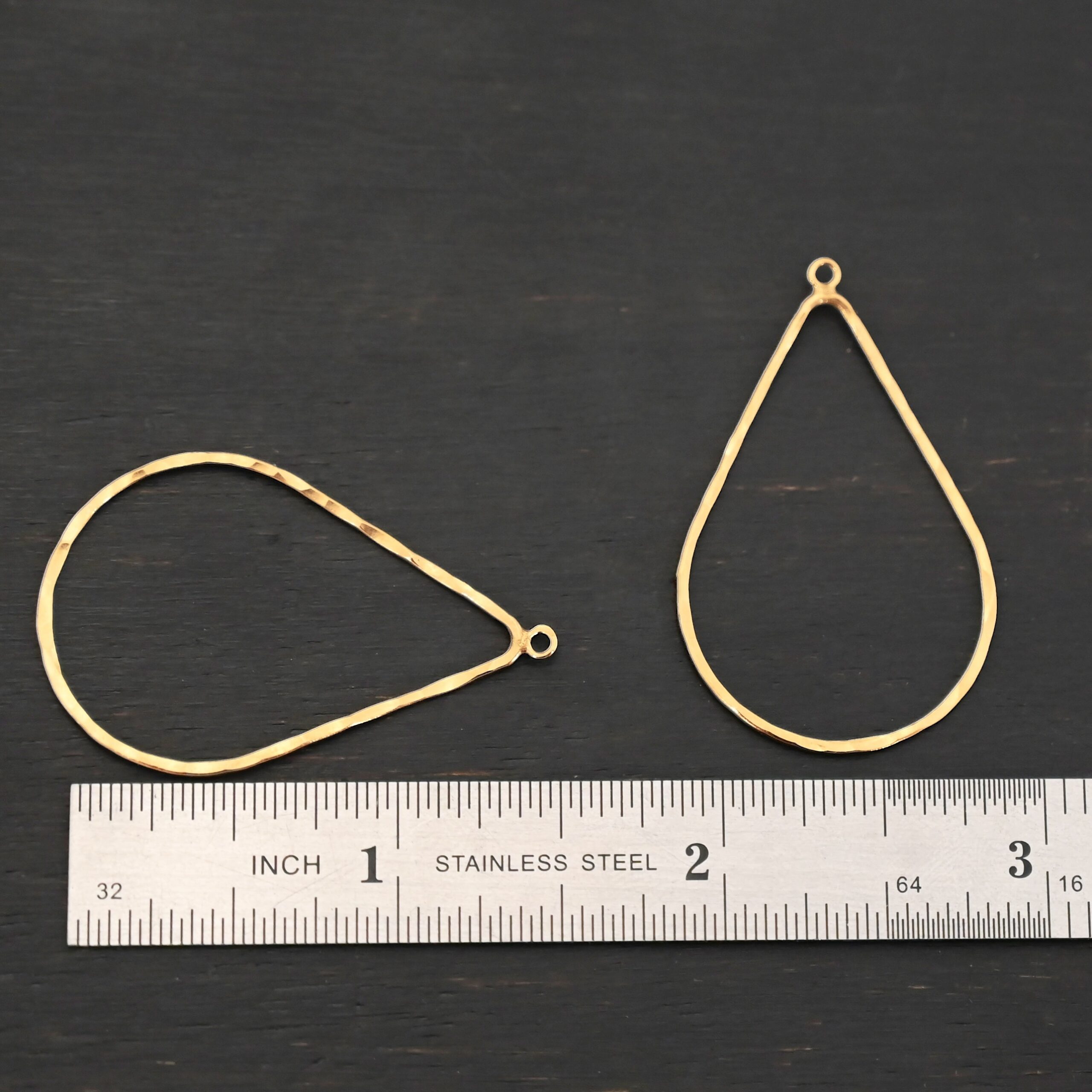 Talia - 14k gold filled Teardrop Chandelier - 38x25mm hammered shown by ruler