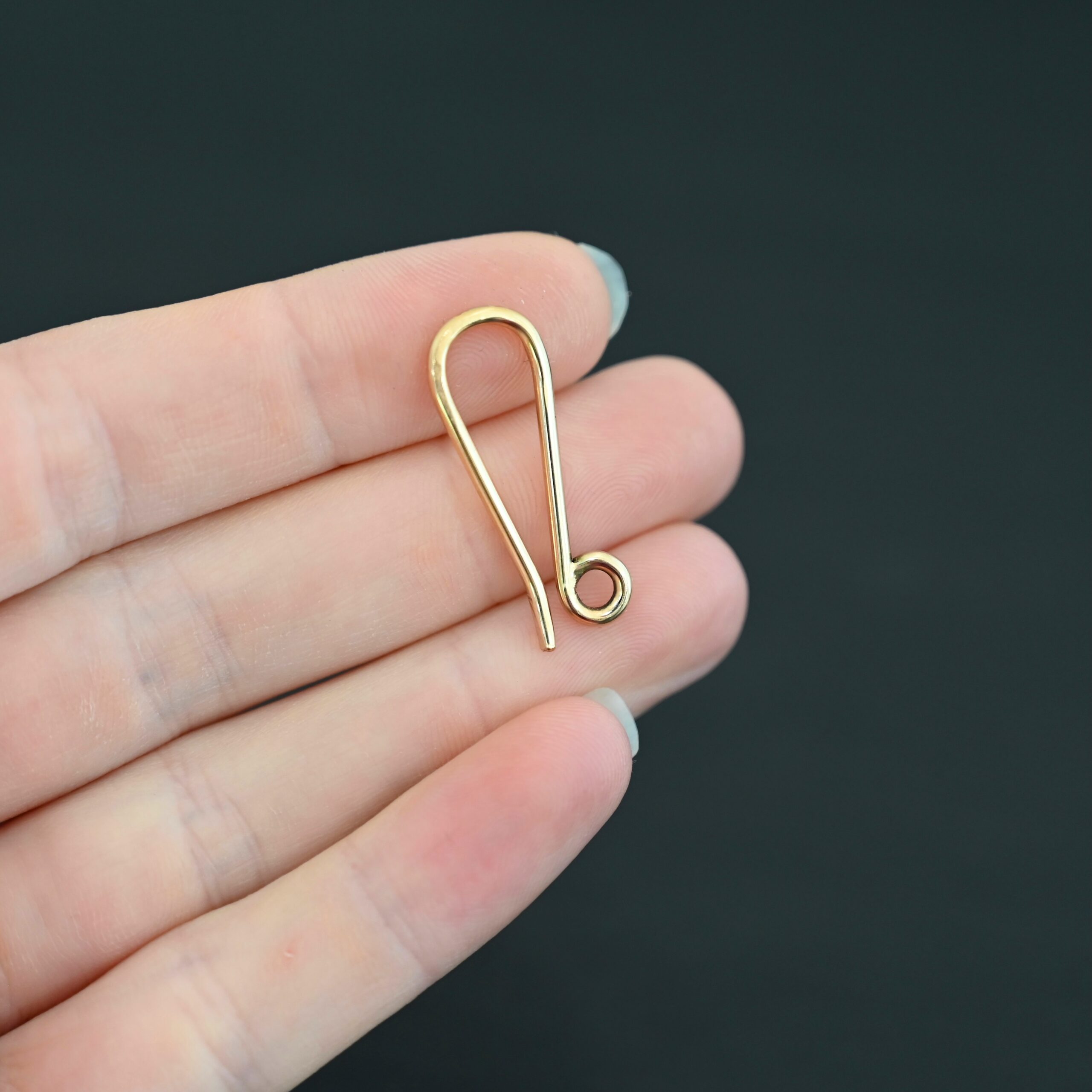Heidi 14k gold filled hook clasp shown in hand