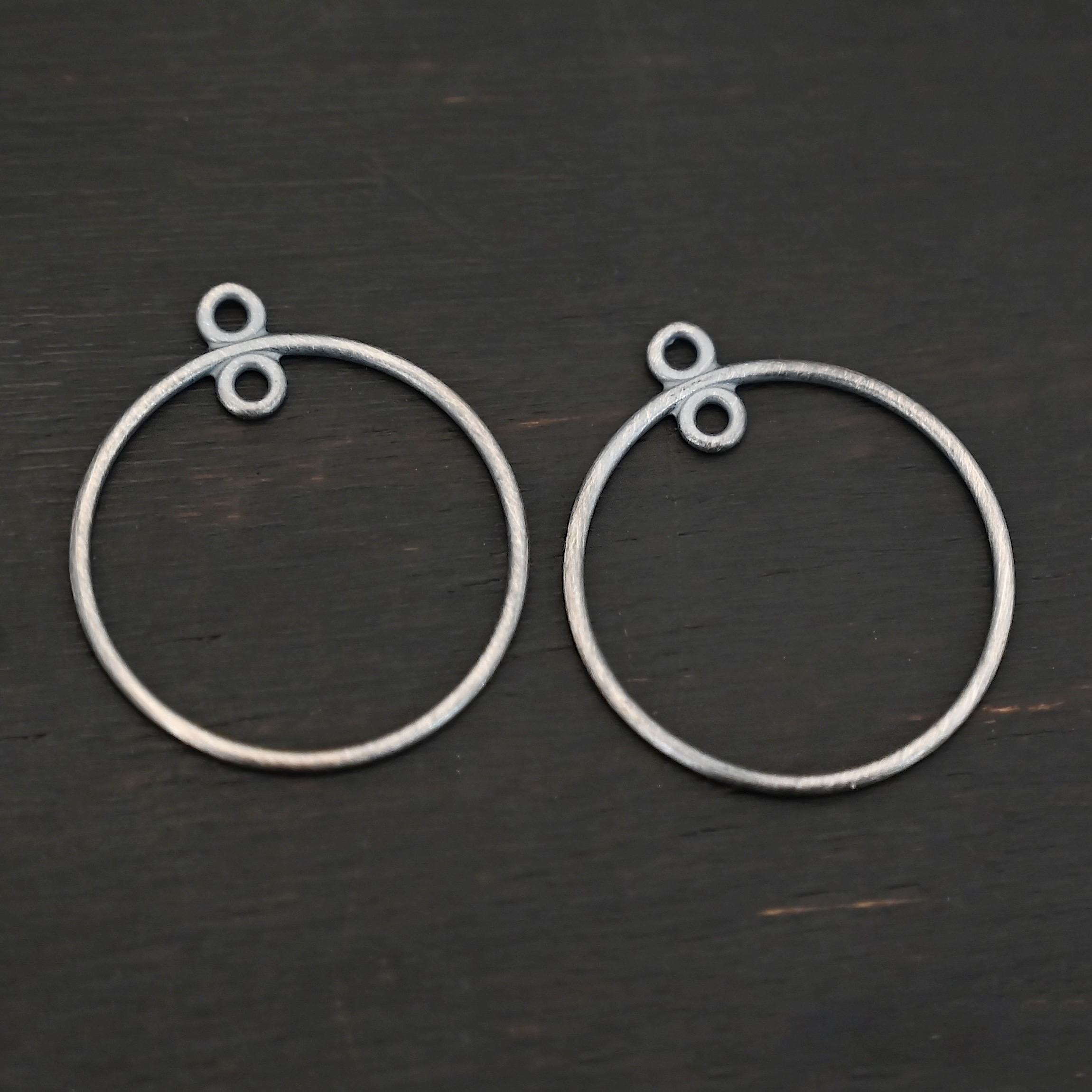 Sterling Silver Tara Hoop Chandelier oxidized smooth shown on dark background