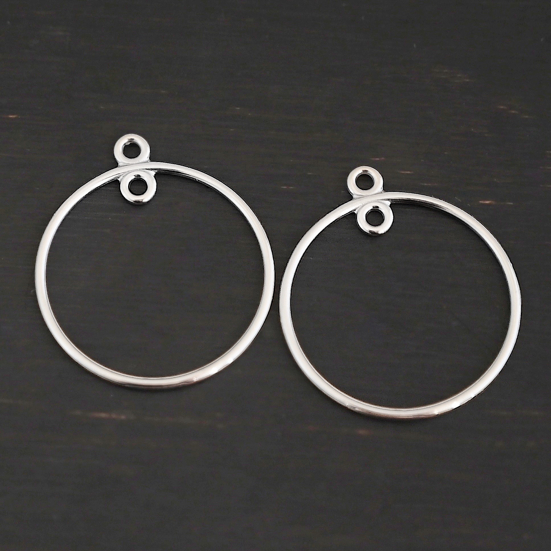 Sterling Silver Tara Hoop Chandelier shiny smooth shown on dark background