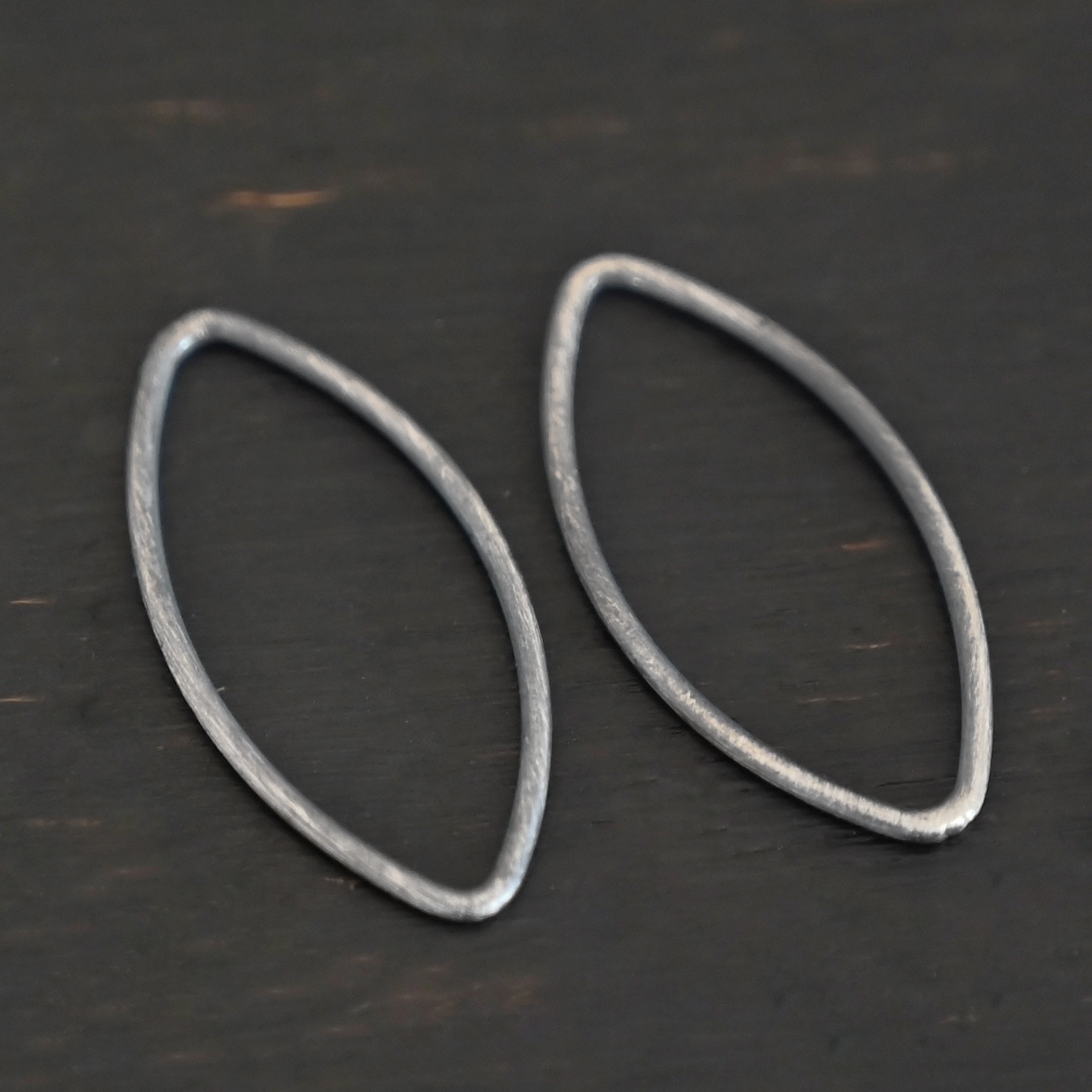 Tanya Marquise Chandelier oxidized smooth Sterling Silver Tanya Marquise Chandelier oxidized smooth shown on dark background