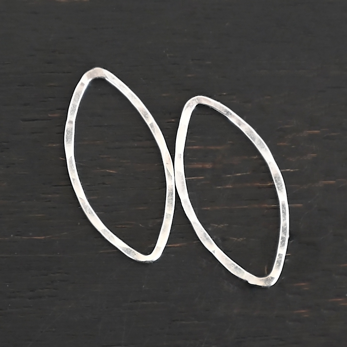 Tanya Marquise Chandelier shiny hammered 20x9mm Sterling Silver Tanya Marquise Chandelier shiny hammered 20x9mm shown on dark background