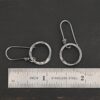 Sterling Silver Flora Hammered Circle Earrings oxidized shown by ruler