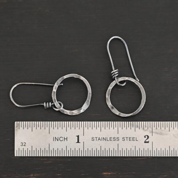 Sterling Silver Flora Hammered Circle Earrings oxidized shown by ruler