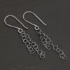 Sterling Silver Florella Dangle Earrings oxidized shown on dark background