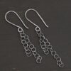 Sterling Silver Florella Dangle Earrings oxidized shown on dark background