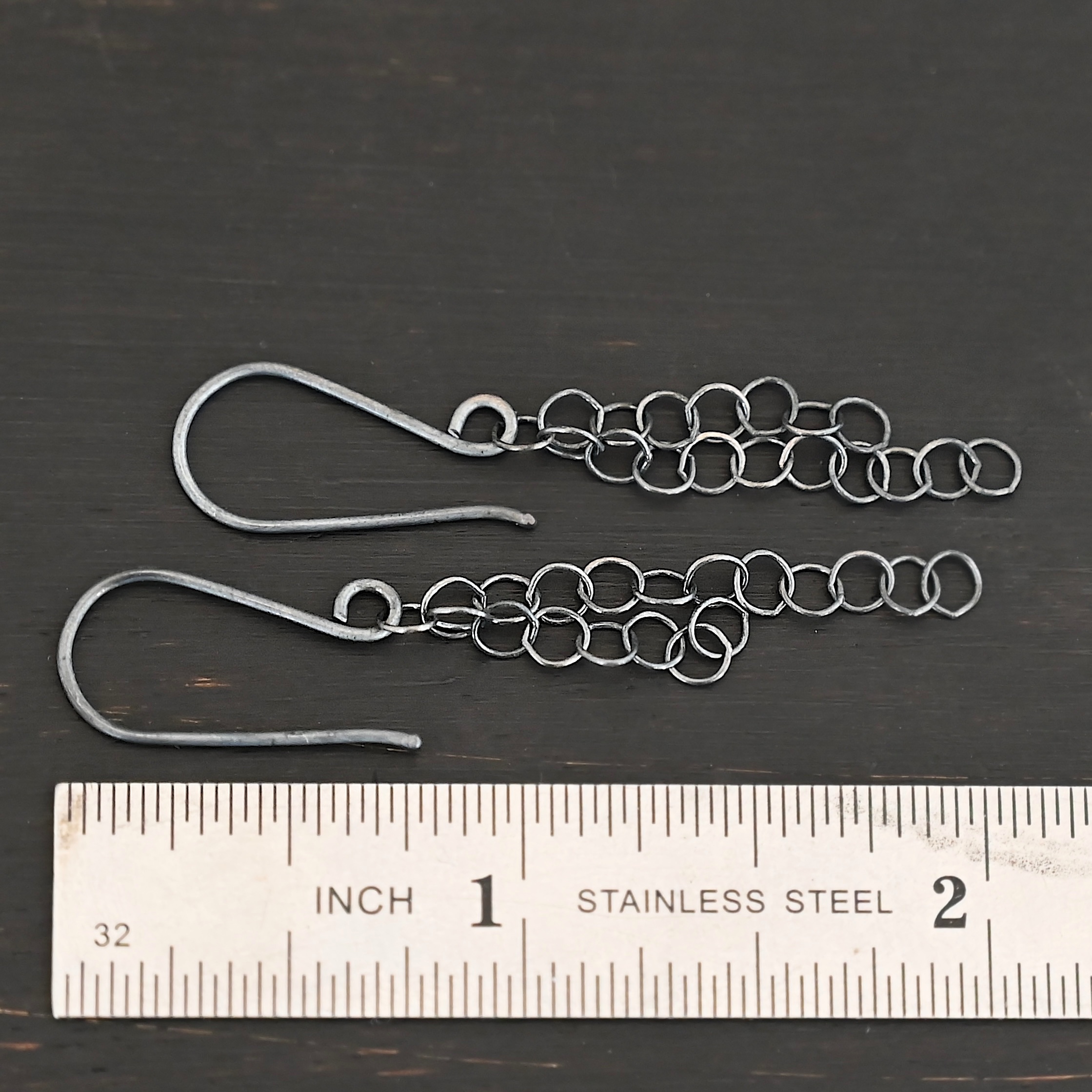 Sterling Silver Florella Dangle Earrings oxidized shown by ruler