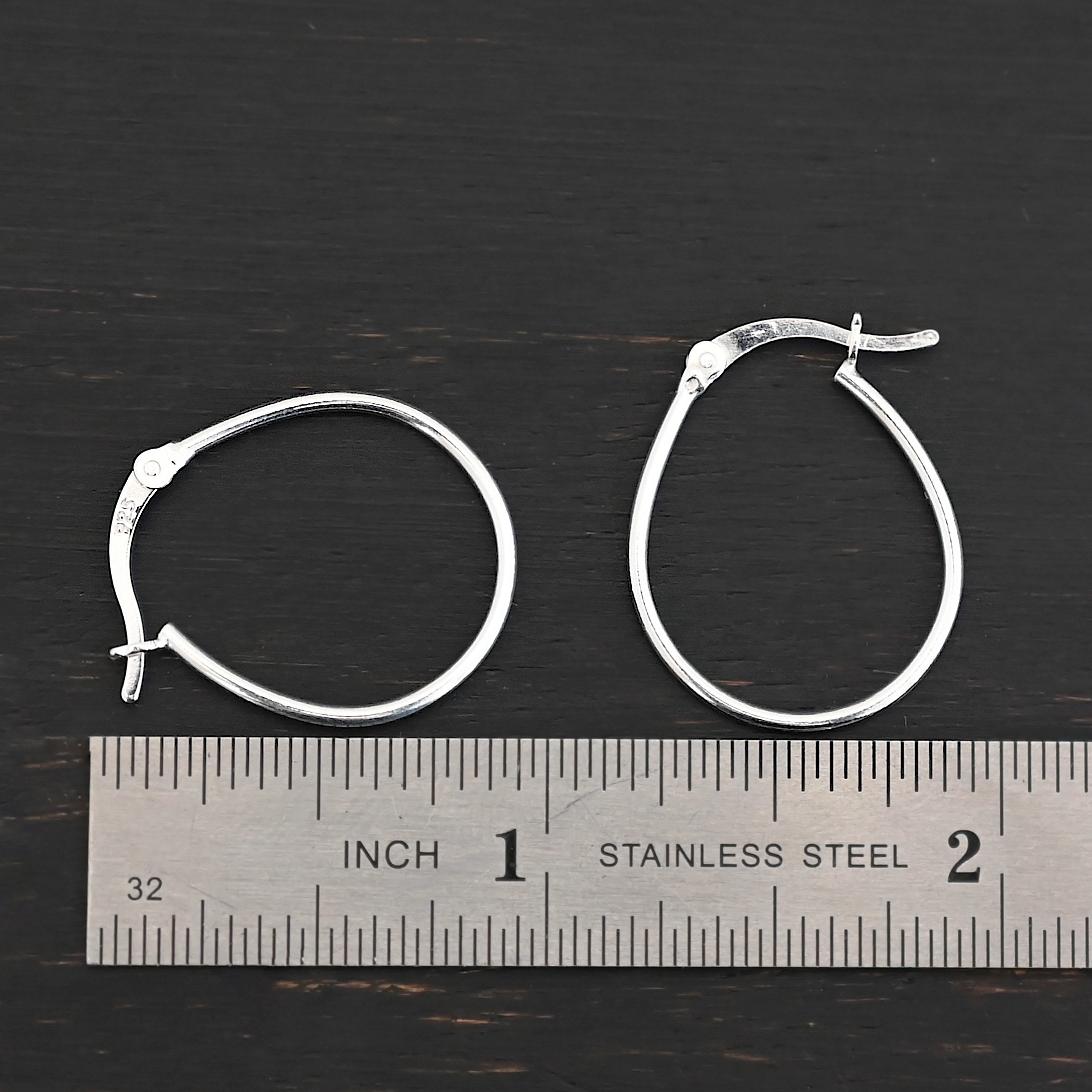 Sterling Silver Fiona Hoop Earrings shiny shown by ruler