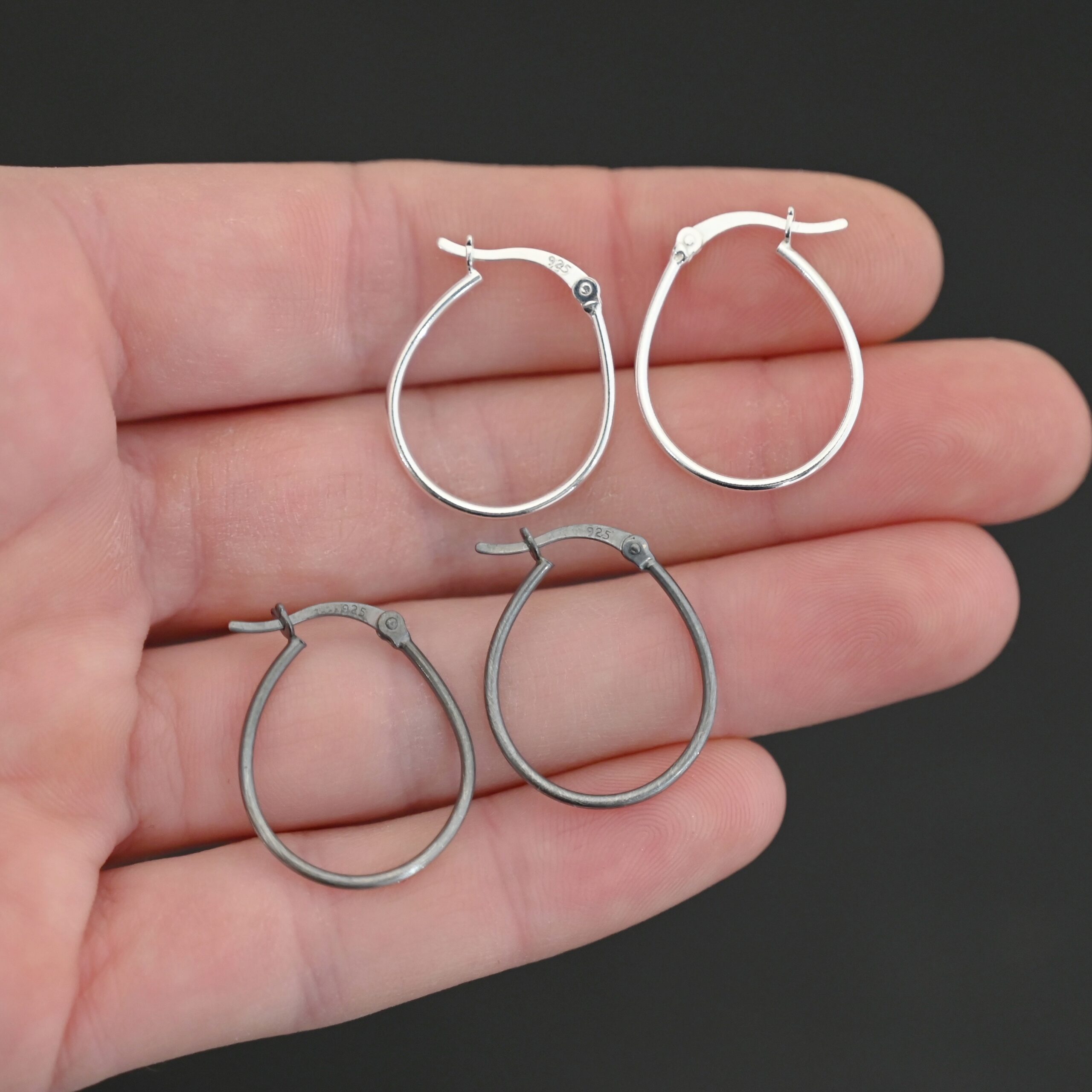 Sterling Silver Fiona Hoop Earrings shiny and oxidized shown in hand