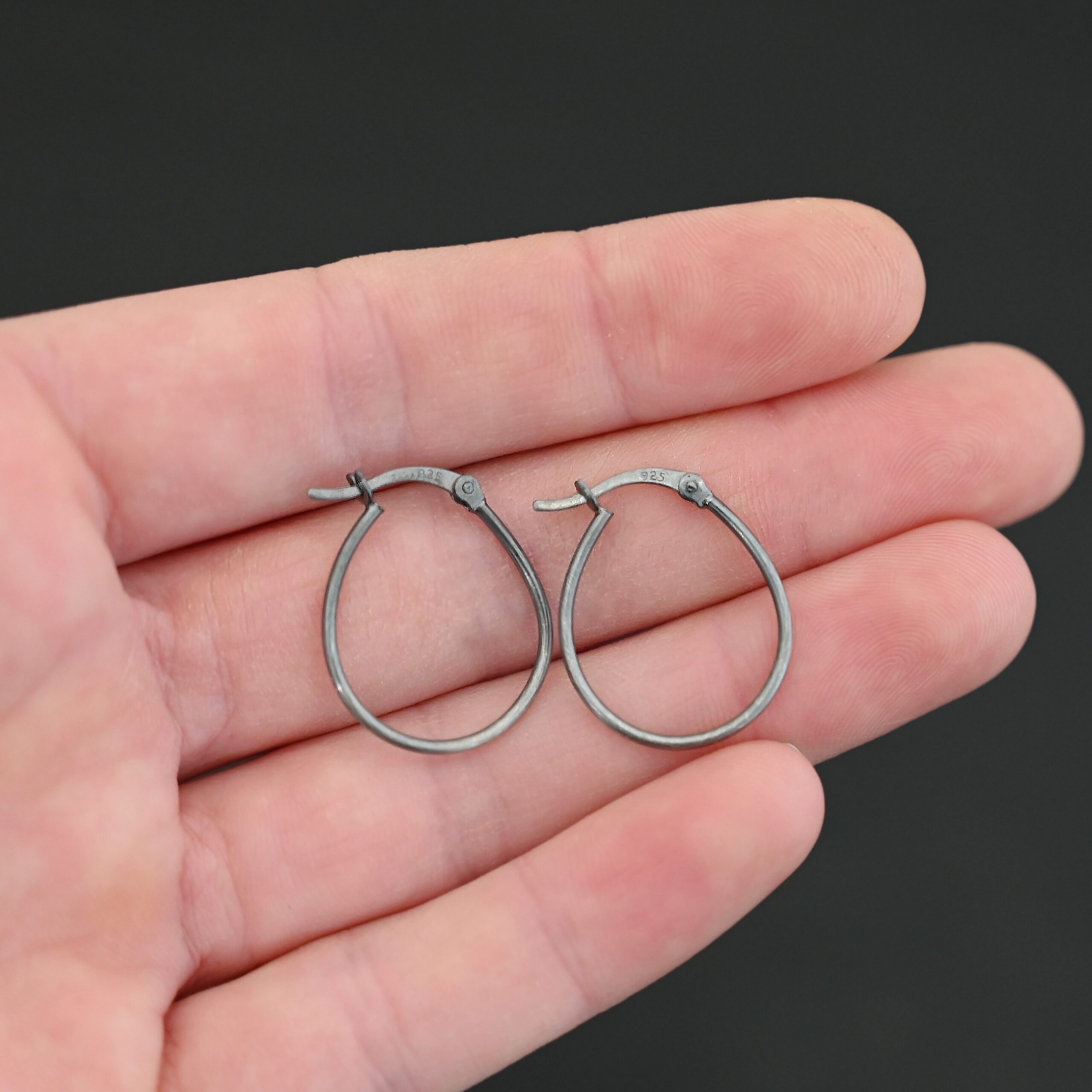Sterling Silver Fiona Hoop Earrings oxidized shown in hand