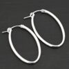 Sterling Silver Frances Oval Hoop Earring 34mm shown on dark background