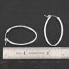Sterling Silver Frances Oval Hoop Earring 34mm shown by ruler