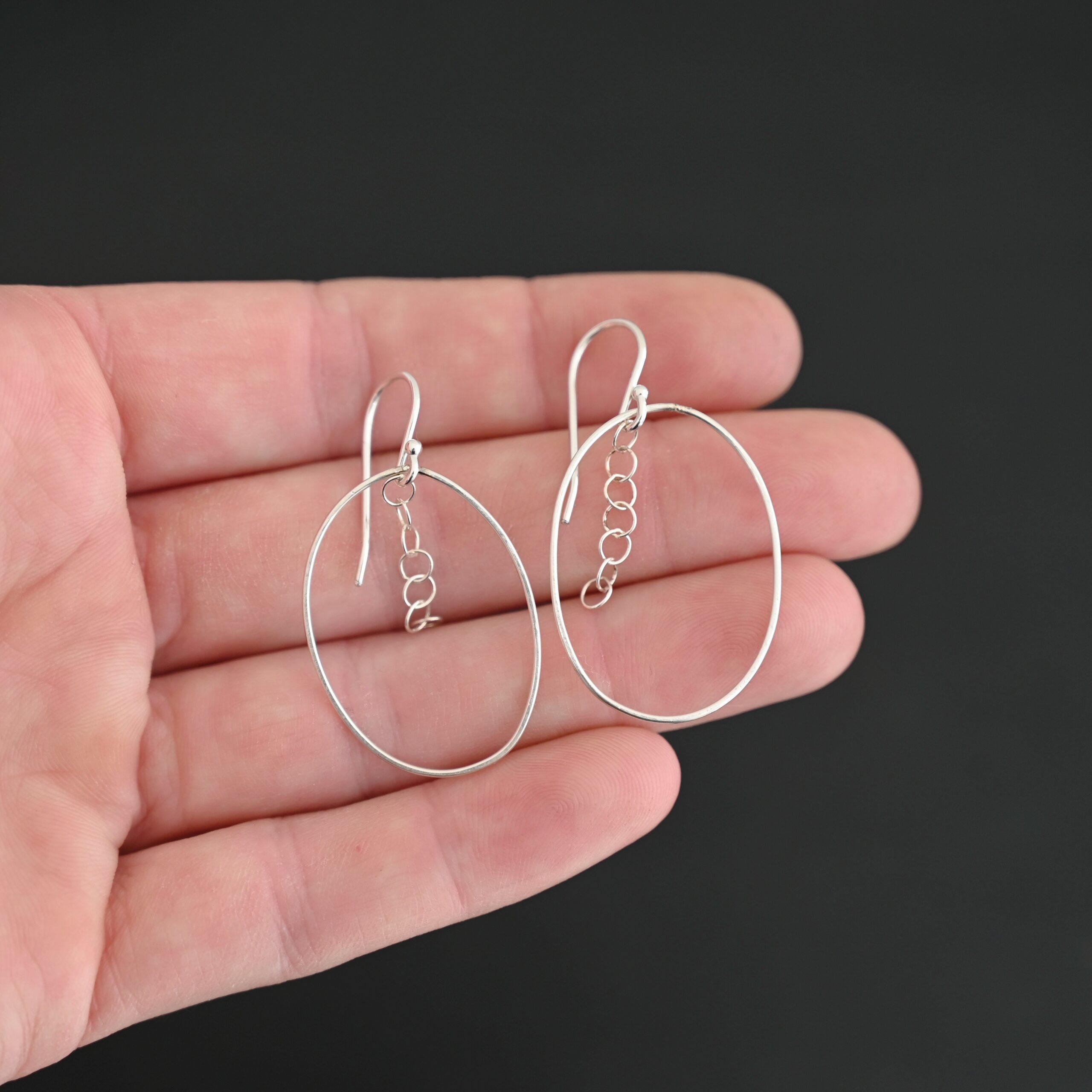 Sterling Silver Farah Chandelier Earring shiny shown in hand