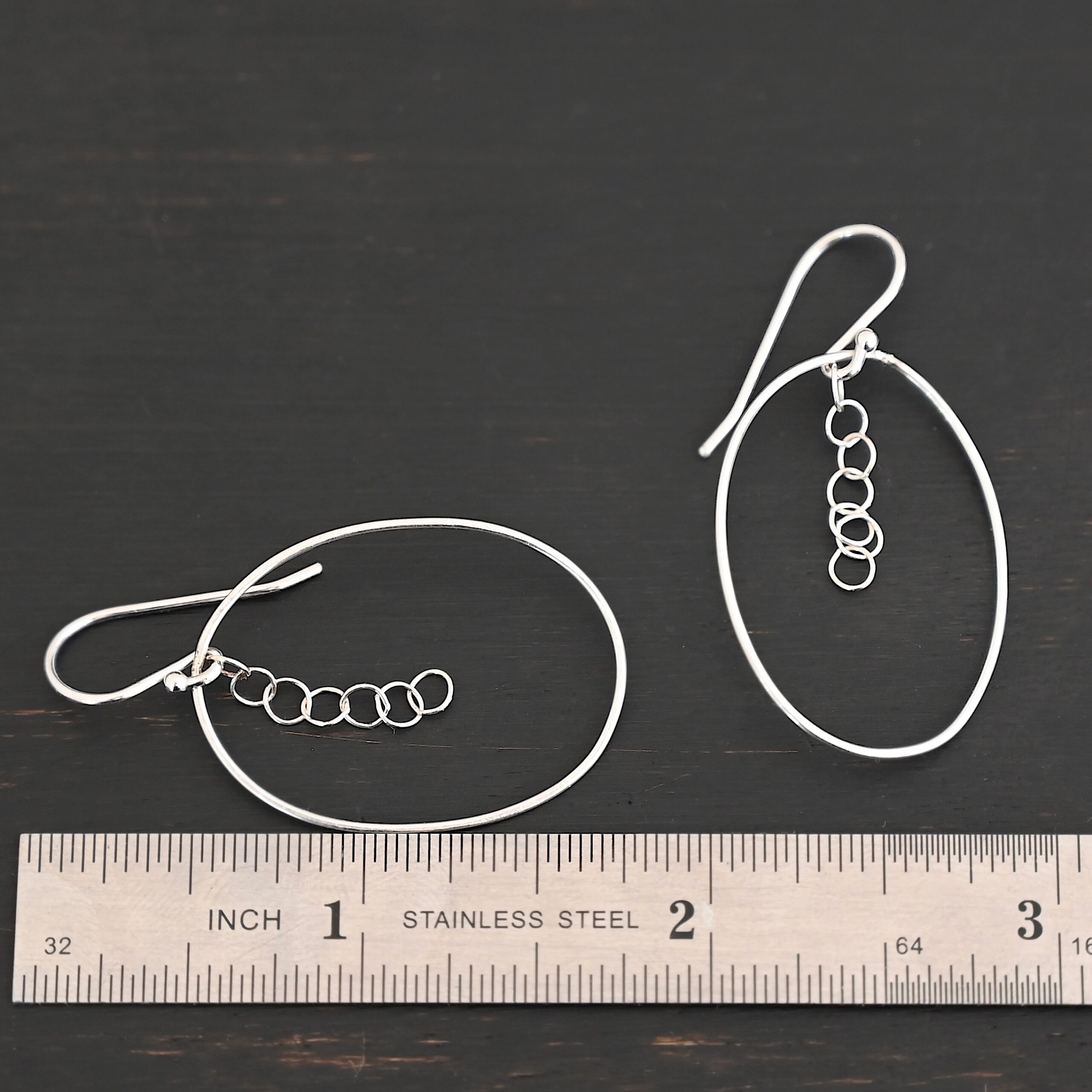 Sterling Silver Farah Chandelier Earring shiny shown by ruler