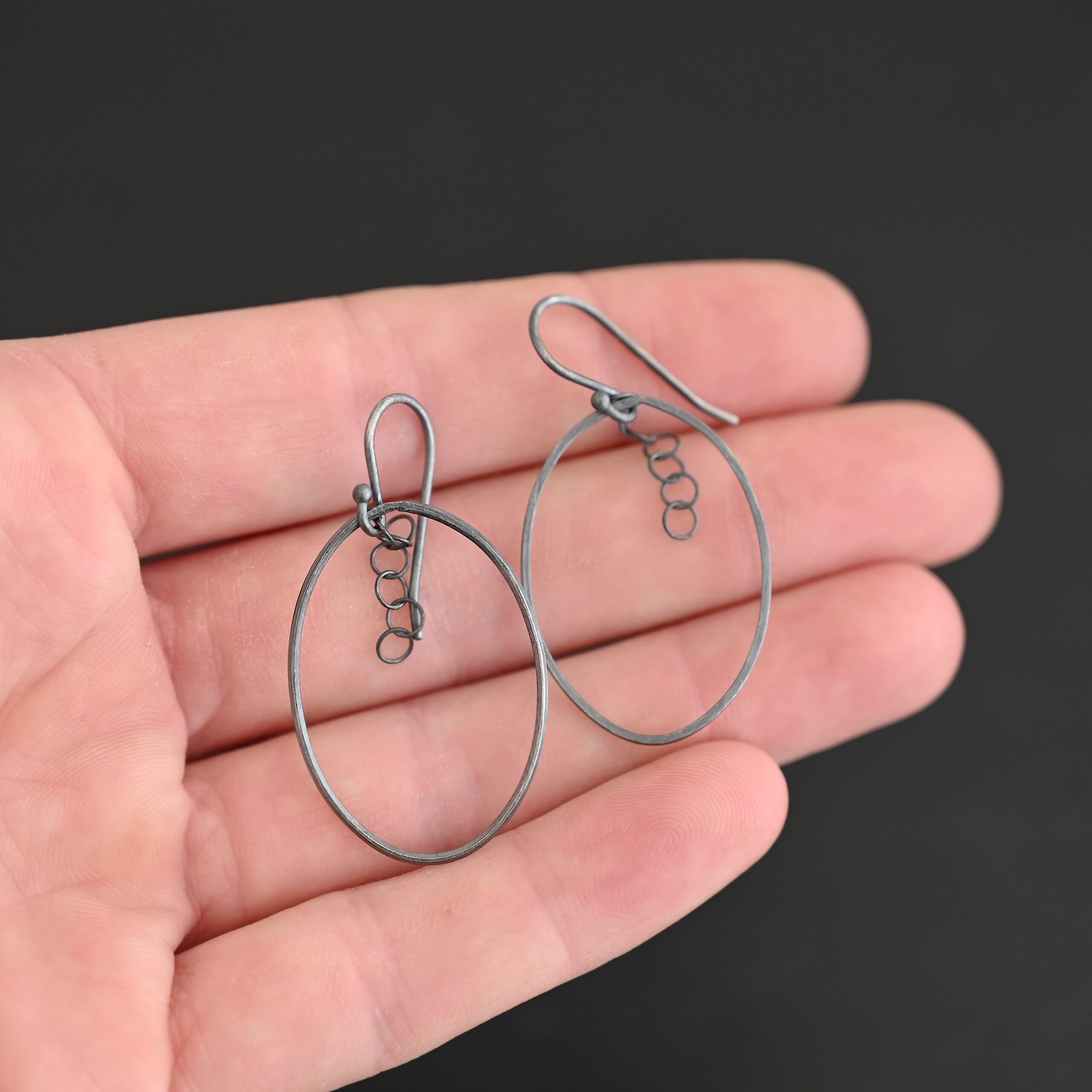 Sterling Silver Farah Chandelier Earring oxidized shown in hand