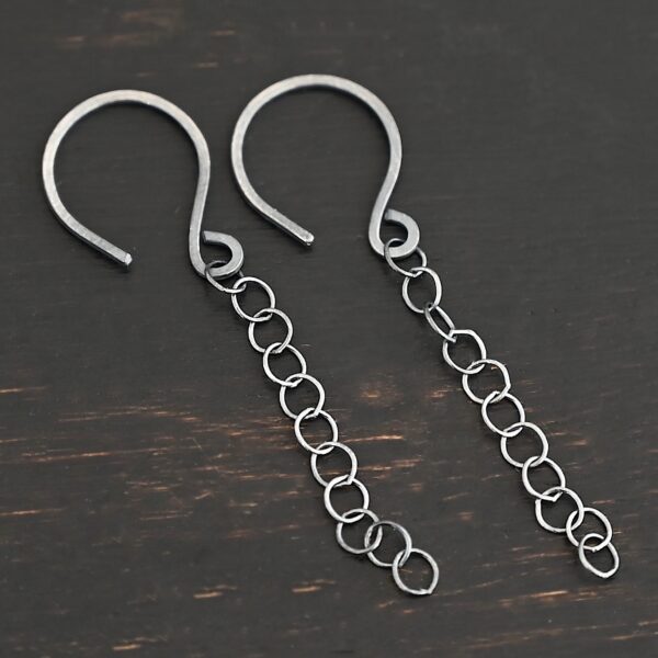 Sterling Silver Fay Dangle Earrings oxidized shown on dark background