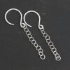 Sterling Silver Fay Dangle Earrings shiny shown on dark background