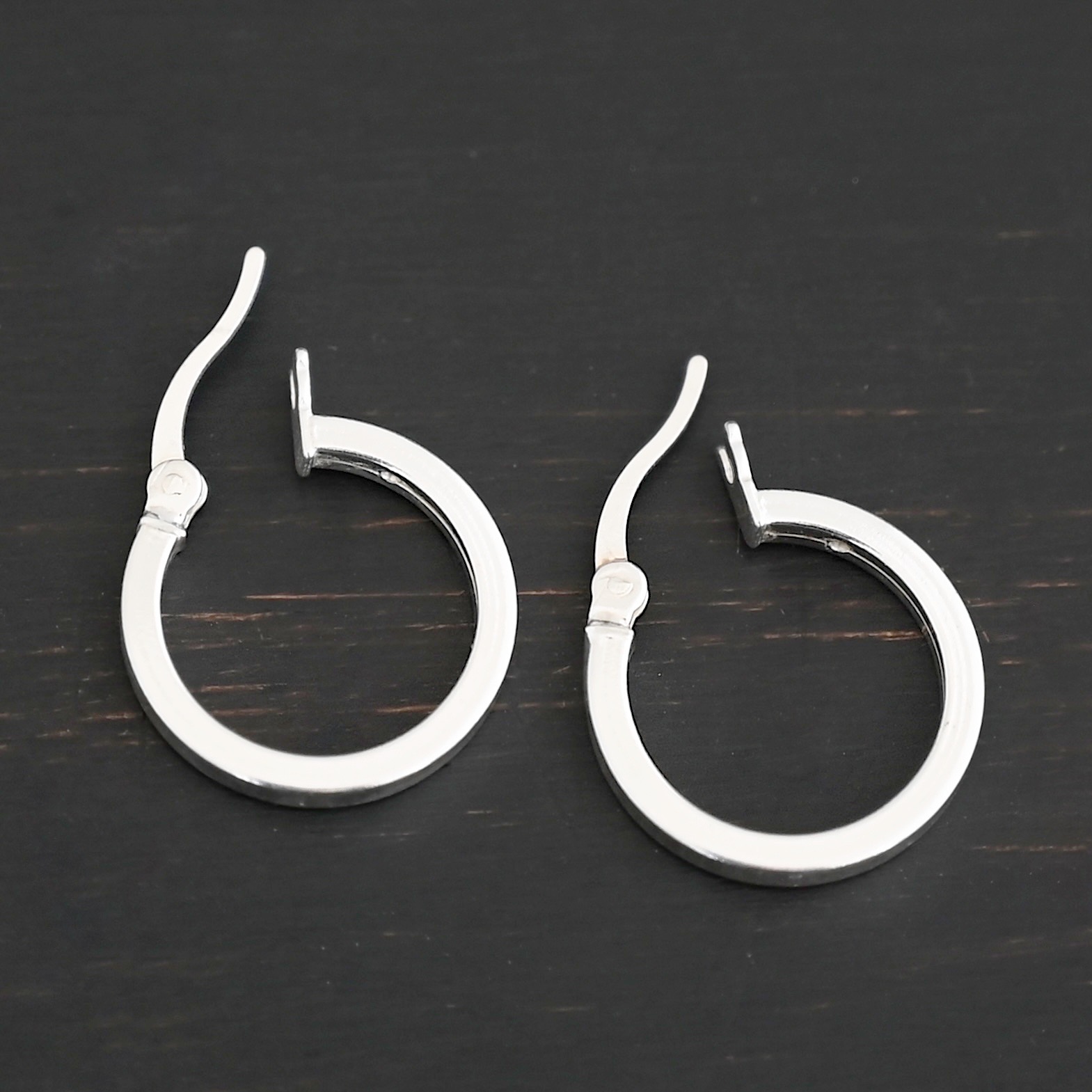 Sterling Silver Frankie Square Hoop Earrings 16mm shiny shown on dark background