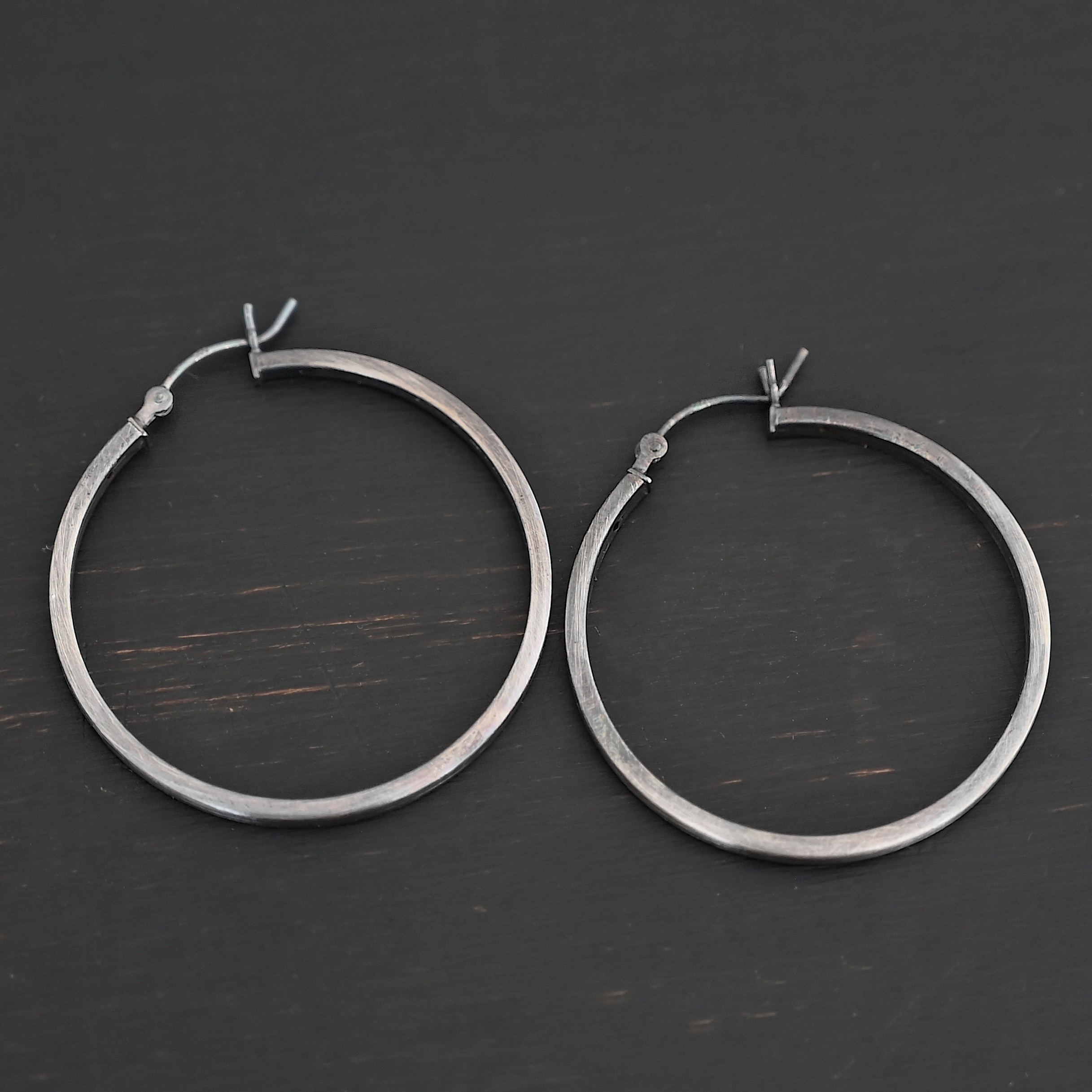 Sterling Silver Frankie Square Hoop Earrings 35mm oxidized shown on dark background